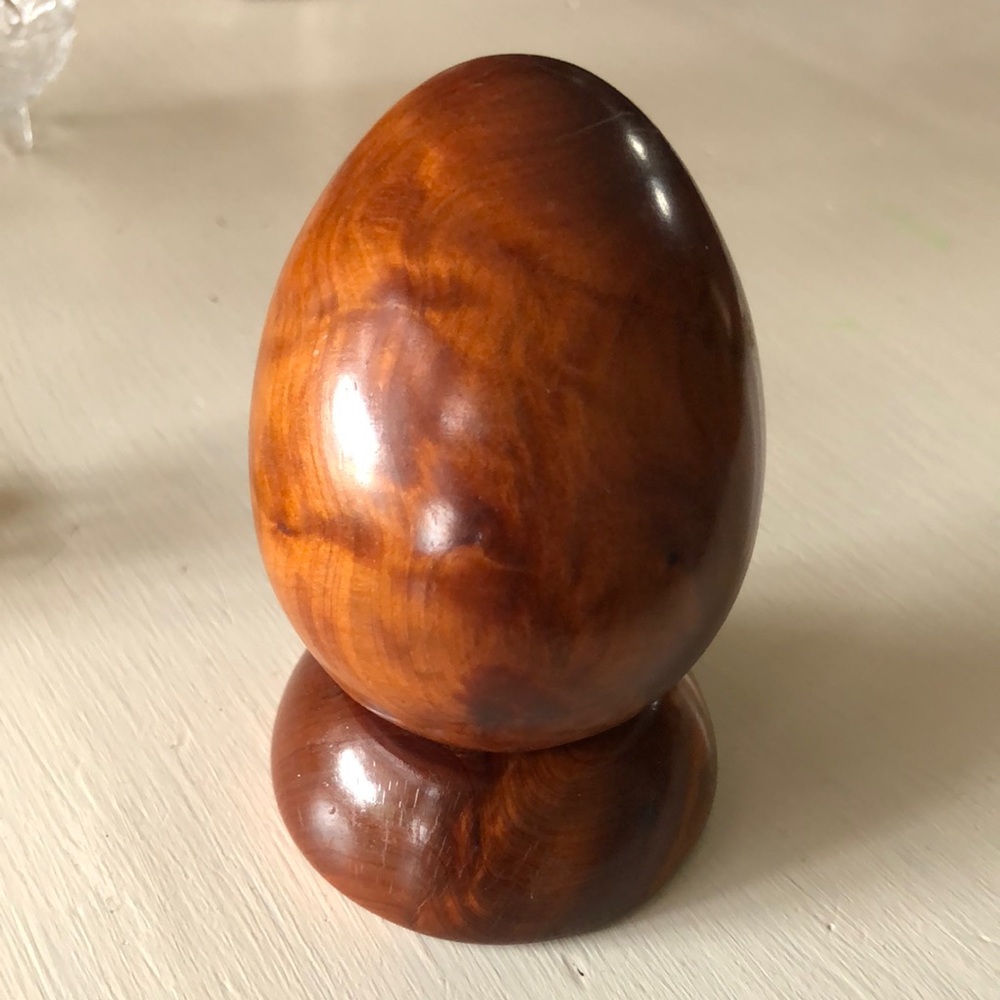 Vintage carved wooden egg with stand